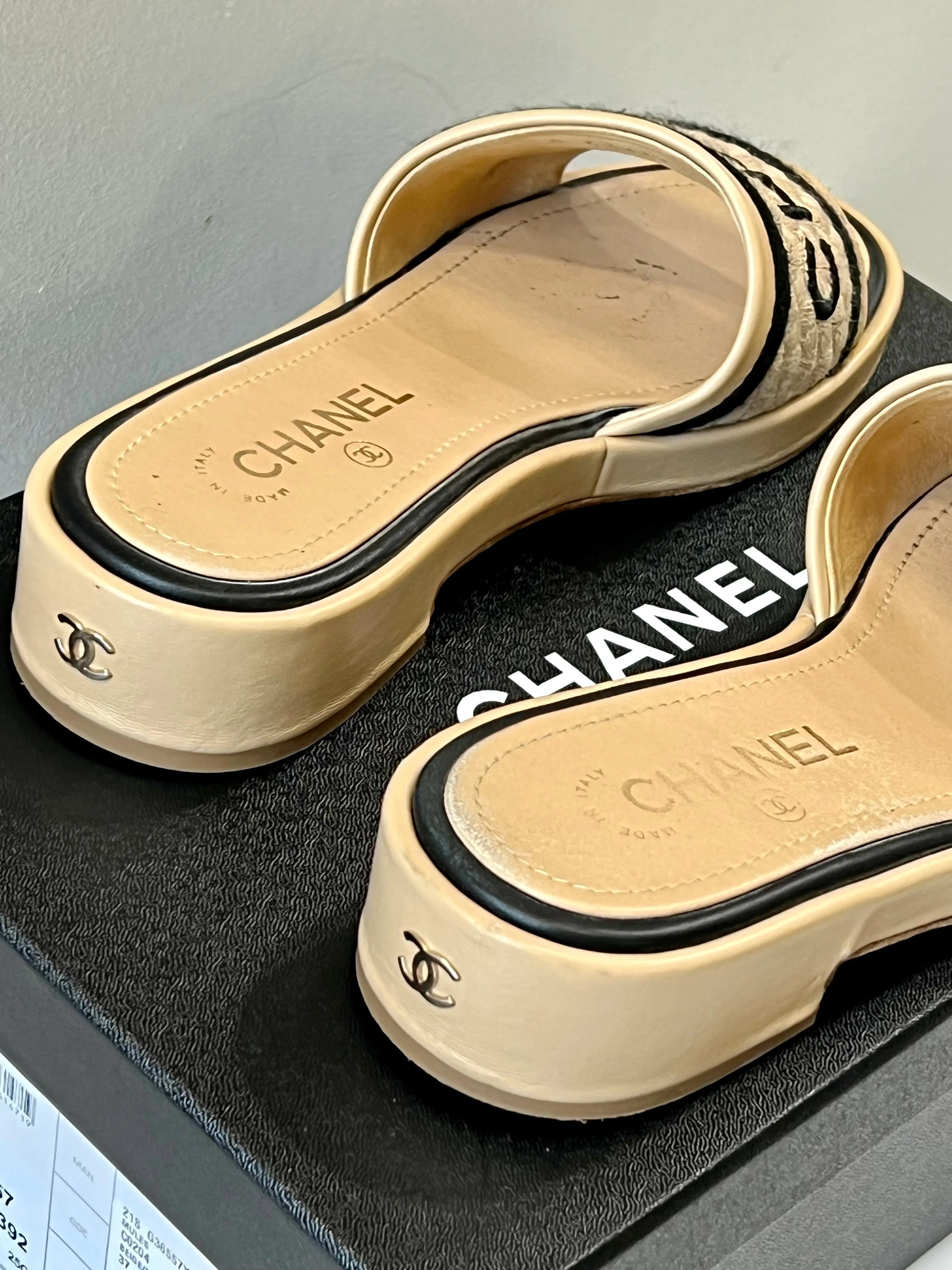 CHANEL LAMBSKIN EMBROIDERED LOGO MULES