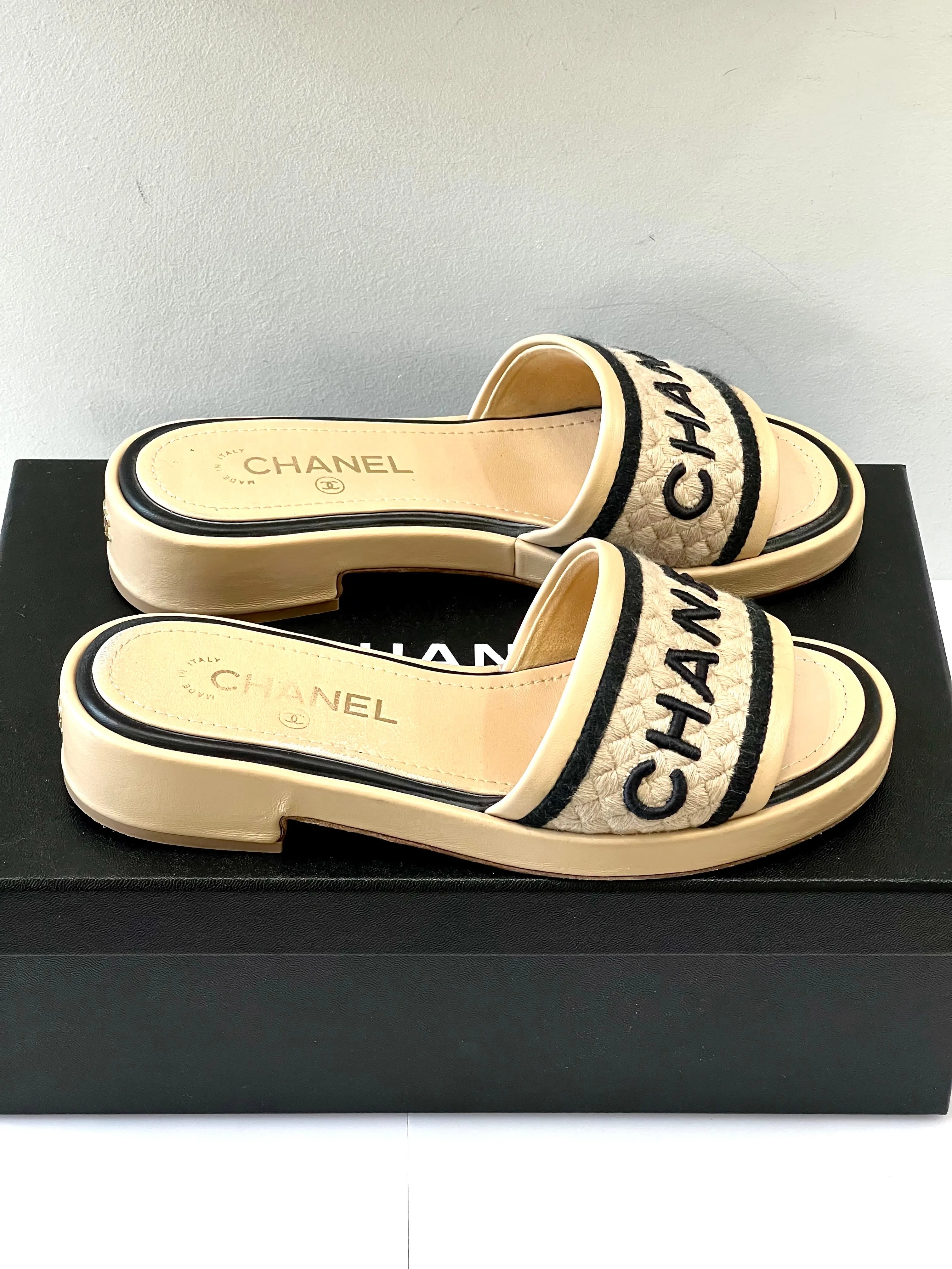 CHANEL LAMBSKIN EMBROIDERED LOGO MULES